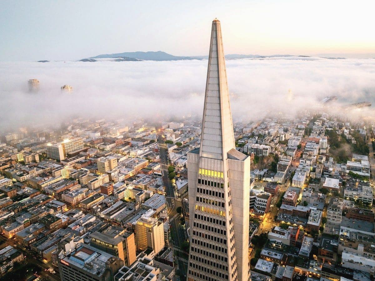 Financial district rising above morning fog